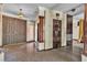 Spacious foyer with a double door entry, decorative column, and tile flooring at 1409 Bonita Ave, Las Vegas, NV 89104