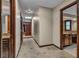 Hallway with a skylight that provides natural light and leads to the bathroom and other rooms at 1409 Bonita Ave, Las Vegas, NV 89104