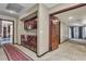 Hallway with carpet and lots of storage space that leads to other rooms in the house at 1409 Bonita Ave, Las Vegas, NV 89104