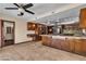 Kitchen area with stainless steel appliances, island cooktop, and sleek countertops at 1409 Bonita Ave, Las Vegas, NV 89104