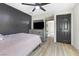 Bedroom with a ceiling fan, and wood floors at 1417 Joshua Way, Las Vegas, NV 89101