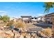 Relaxing backyard area with a pond, hot tub and an RV for camping at home at 150 Spruce Ln, Pahrump, NV 89048