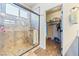 Shower with a glass door and view of the walk in closet at 150 Spruce Ln, Pahrump, NV 89048