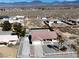 Aerial view of the property showcasing the fully fenced yard and neighborhood at 2080 Mount Charleston Dr, Pahrump, NV 89048