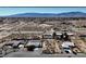 Neighborhood of single story homes with desert landscaping and views of snow capped mountains in the distance at 2080 Mount Charleston Dr, Pahrump, NV 89048