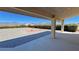 Patio view of the backyard featuring gravel landscaping with mountain views at 2080 Mount Charleston Dr, Pahrump, NV 89048