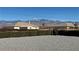 View of neighboring homes with gorgeous mountain views at 2080 Mount Charleston Dr, Pahrump, NV 89048