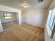 Cozy bedroom with carpet, closet, and a bright window that lets in plenty of natural light at 2080 Mount Charleston Dr, Pahrump, NV 89048