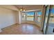 Bright dining area featuring large windows with a view of the yard at 2080 Mount Charleston Dr, Pahrump, NV 89048