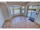 Cozy dining area with bay windows and a sliding glass door to the patio at 2080 Mount Charleston Dr, Pahrump, NV 89048