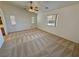 Spacious main bedroom featuring carpet and windows at 2080 Mount Charleston Dr, Pahrump, NV 89048