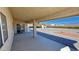 Covered patio overlooking the gravel landscaped backyard at 2080 Mount Charleston Dr, Pahrump, NV 89048