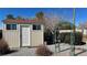 Charming storage shed surrounded by mature landscaping at 2080 Mount Charleston Dr, Pahrump, NV 89048