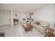 Bright living room featuring tile floors, white sofas, and ample natural light at 2194 Camel Mesa Dr, Laughlin, NV 89029