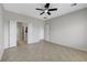 Main bedroom features tile flooring, double doors to ensuite, and neutral wall colors at 2204 Bay Thrush Way, North Las Vegas, NV 89084