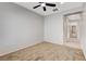 Bedroom featuring carpet and a ceiling fan, offering natural light at 2204 Bay Thrush Way, North Las Vegas, NV 89084