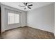 Cozy bedroom featuring neutral tones and a ceiling fan at 2204 Bay Thrush Way, North Las Vegas, NV 89084