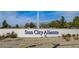 Entrance sign for Sun City Aliante, welcoming residents with lush landscaping and a water fountain at 2204 Bay Thrush Way, North Las Vegas, NV 89084