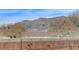 Mountain views from the backyard with partial backyard privacy wall at 2204 Bay Thrush Way, North Las Vegas, NV 89084