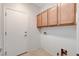 Convenient mud room with overhead cabinets and exterior access at 2204 Bay Thrush Way, North Las Vegas, NV 89084