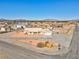 Expansive aerial view of home, showcasing desert landscaping and mountain views at 240 Ember St, Pahrump, NV 89048