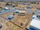 Aerial view featuring an enclosed property, showing the home and the surrounding landscape at 240 Ember St, Pahrump, NV 89048