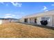 Spacious backyard with lawn, patio, and mountain views at 240 Ember St, Pahrump, NV 89048