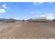 Expansive vacant land with surrounding neighborhood homes at 240 Ember St, Pahrump, NV 89048