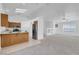 Cozy kitchen area next to the living room, featuring a breakfast bar and modern appliances at 240 Ember St, Pahrump, NV 89048