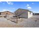 Shed in backyard, enclosed by a fence and some trees at 240 Ember St, Pahrump, NV 89048