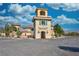 Sanders Winery building featuring a bell tower, detailed architecture, and ample parking at 240 Ember St, Pahrump, NV 89048