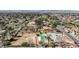 Wide aerial view of the neighborhood with multiple backyard pools and mountain views at 2711 Ashby Ave, Las Vegas, NV 89102