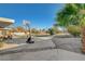 Spacious backyard with pool, patio, basketball hoop, and low maintenance landscaping at 2711 Ashby Ave, Las Vegas, NV 89102