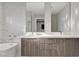 Luxurious bathroom with double vanity, stylish cabinets, and a large mirror at 2711 Ashby Ave, Las Vegas, NV 89102