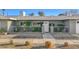 Well-maintained home with decorative fence, charming front yard and inviting entrance at 2711 Ashby Ave, Las Vegas, NV 89102