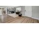 Sitting room featuring shutters, hardwood floors, and decorative plants creating a cozy space at 2711 Ashby Ave, Las Vegas, NV 89102