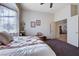 Bedroom with a bed, a ceiling fan, and a view into the hall at 2714 Thomasville Ave, Henderson, NV 89052