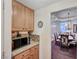 Pantry features custom cabinets and granite countertops adjacent to dining room at 2714 Thomasville Ave, Henderson, NV 89052