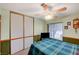 Relaxing bedroom includes a ceiling fan, window, and a double-door closet at 2974 Lindell Rd, Las Vegas, NV 89146