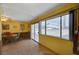 Bright dining room with a sliding glass door to the backyard at 2974 Lindell Rd, Las Vegas, NV 89146