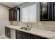 Kitchen detail showcasing granite counters, stainless steel dishwasher and double sink at 3026 Coveri Ct, Las Vegas, NV 89141