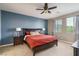 Relaxing main bedroom featuring a queen-sized bed, soft lighting, and a soothing color palette at 3034 Scenic Rhyme Ave, Henderson, NV 89044