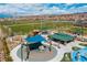 Community park featuring green grass, playground, seating and picnic area, creating a fun outdoor space at 3034 Scenic Rhyme Ave, Henderson, NV 89044