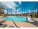 Community pool area features a large pool with a lift, plenty of lounge chairs, and beautiful mountain views at 3034 Scenic Rhyme Ave, Henderson, NV 89044