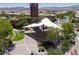 A town center with a covered outdoor gathering place offers a central location for community events and socializing at 3034 Scenic Rhyme Ave, Henderson, NV 89044