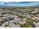 View of the neighborhood with well maintained landscaping in a suburban setting at 3516 Bryan Keith Ave, North Las Vegas, NV 89031