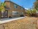 View of the home's backyard, showcasing a patio and spacious yard area at 3516 Bryan Keith Ave, North Las Vegas, NV 89031