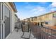 Balcony with seating area offers views of the neighborhood and clear blue skies at 356 Free Fall Ave, North Las Vegas, NV 89084