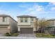 Beautiful two-story home featuring a two-car garage, low maintenance yard, and stucco siding at 356 Free Fall Ave, North Las Vegas, NV 89084