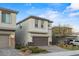 Attractive two-story house with a brick driveway, a two-car garage, and desert-friendly landscaping at 356 Free Fall Ave, North Las Vegas, NV 89084